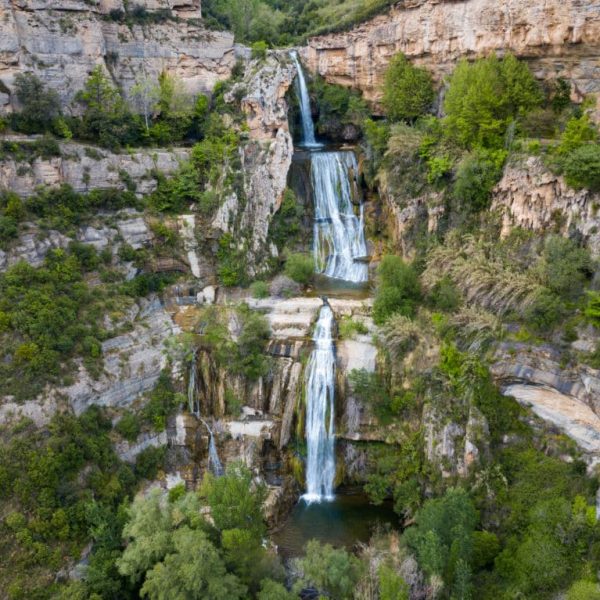 View from drone on waterfall on Sant Miquel del Fai in the Spain.